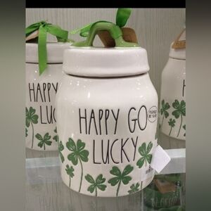Rae Dunn Happy Go Lucky Ceramic Jar with Green Clover Design